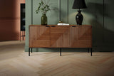 Zephyr sideboard with angled fluted doors against a green panelled wall