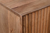 Close-up of the Zephyr sideboard top corner and fluted door edge