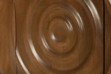 Close-up of the carved rings on a Zibello door in Light Walnut: soft rounded waves around a raised centre, in mango wood