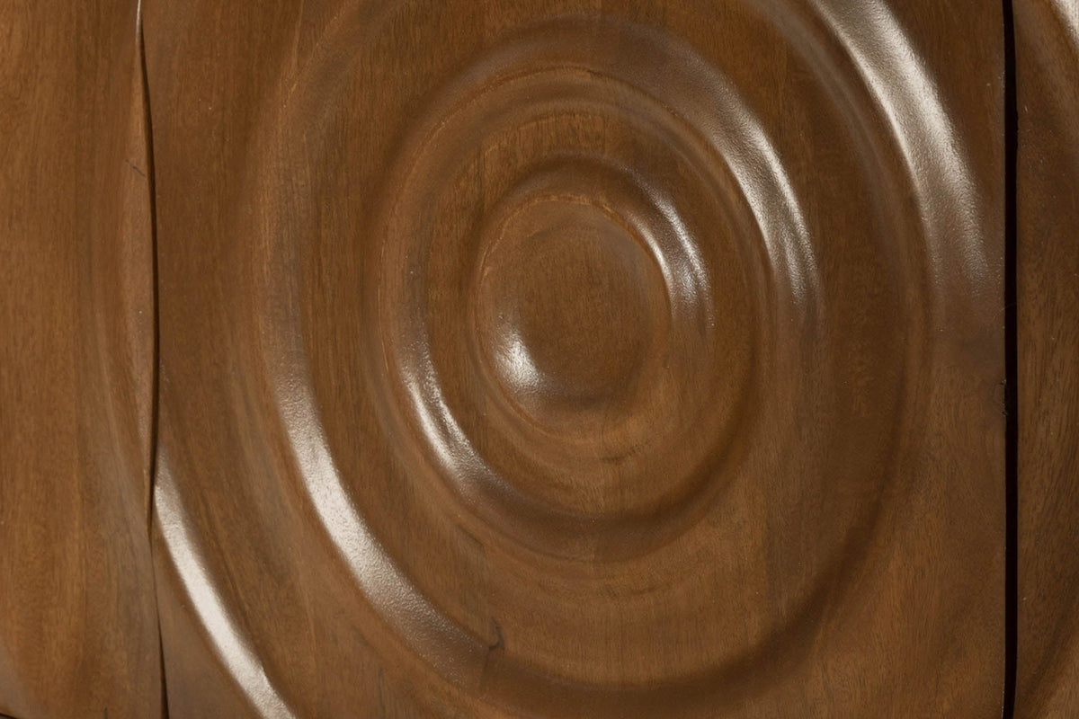 Close-up of the carved rings on a Zibello door in Light Walnut: soft rounded waves around a raised centre, in mango wood