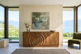 Zibello sideboard in Light Walnut, front view, against a board-formed concrete wall in a Cully vineyard house in Lavaux