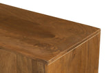 Close-up of the Zibello top corner in Light Walnut: the flat mango top flush with the end panel and its grain