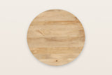 The round Zuccarello top seen from above in Natural: mango boards glued edge to edge, the grain running one way