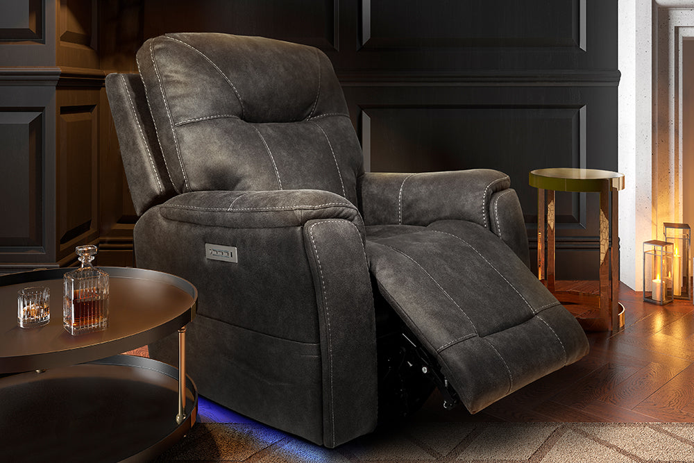 In a Living Room, There is Left-Side's Acute Angle Front View of A Classic, Steel Grey, Single Seat, Fabric Recliner Chair with a Barstool in Right-Side and a Wine Bottle with Wine Glass on Steel Wine Tray in Left-Side.