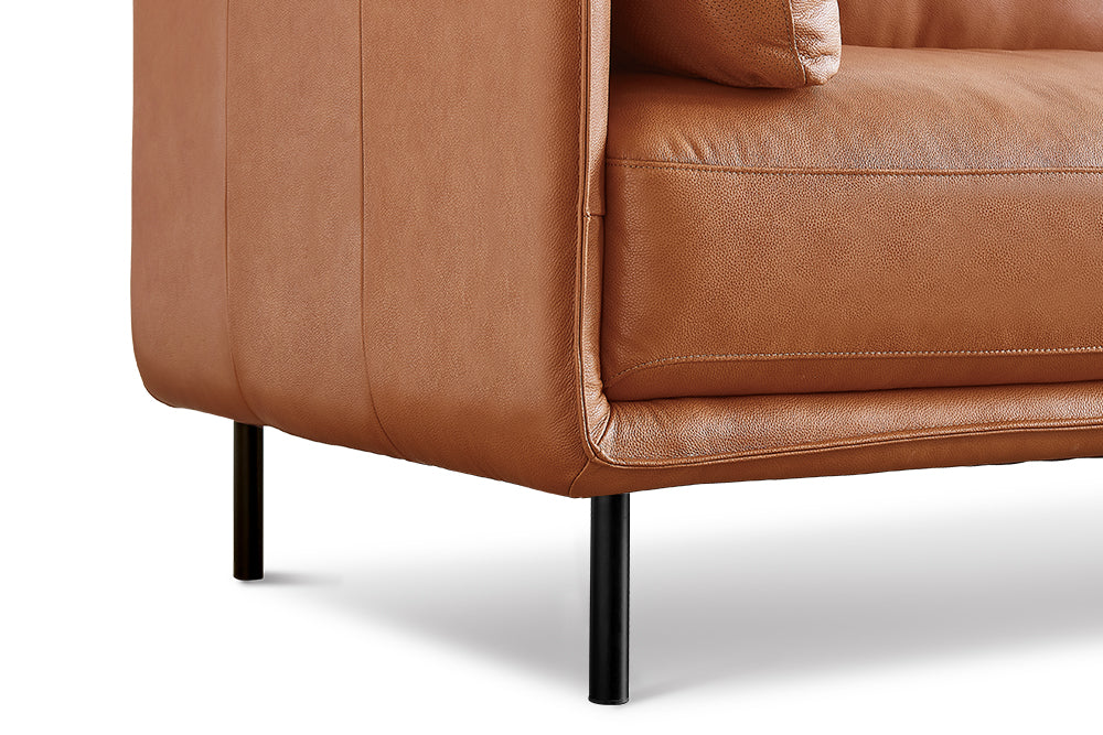 Left-Side Half Seat and Steel Legs Close-Up View of A Modern, Royal Cognac, Two Seats, Chloe Contemporary Italian Nappa Leather Sofa.
