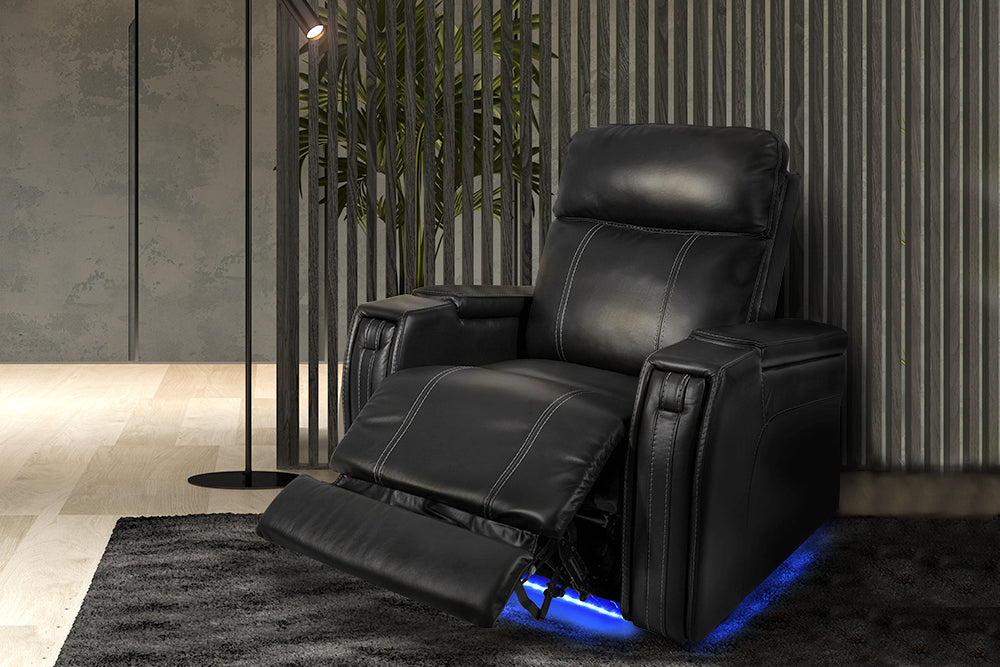 Right Angled Front View of A Luxurious, Black, Single Seat, Italian Leather Recliner Chair in a Living Room.