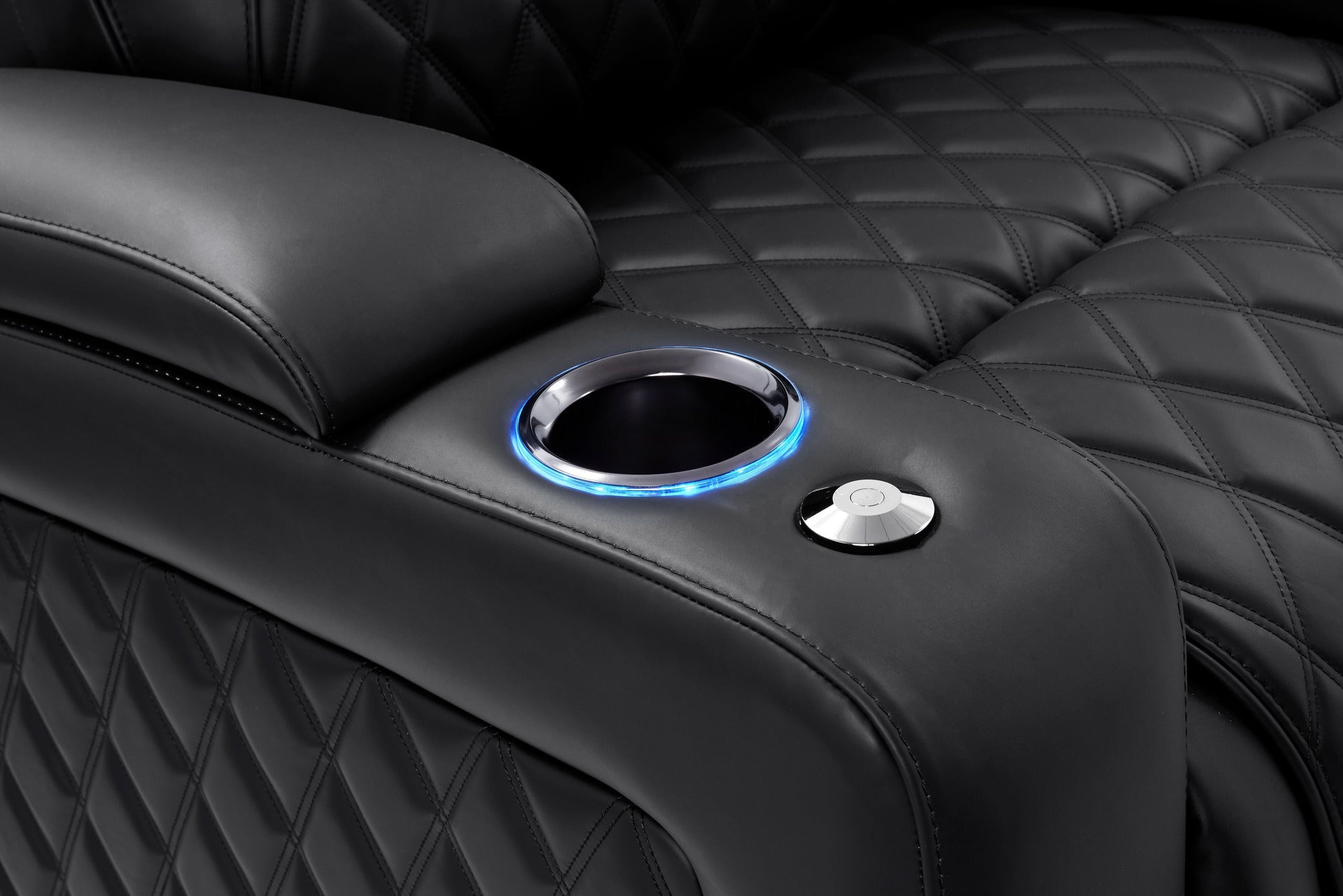 Black chrome controls and cupholder detail