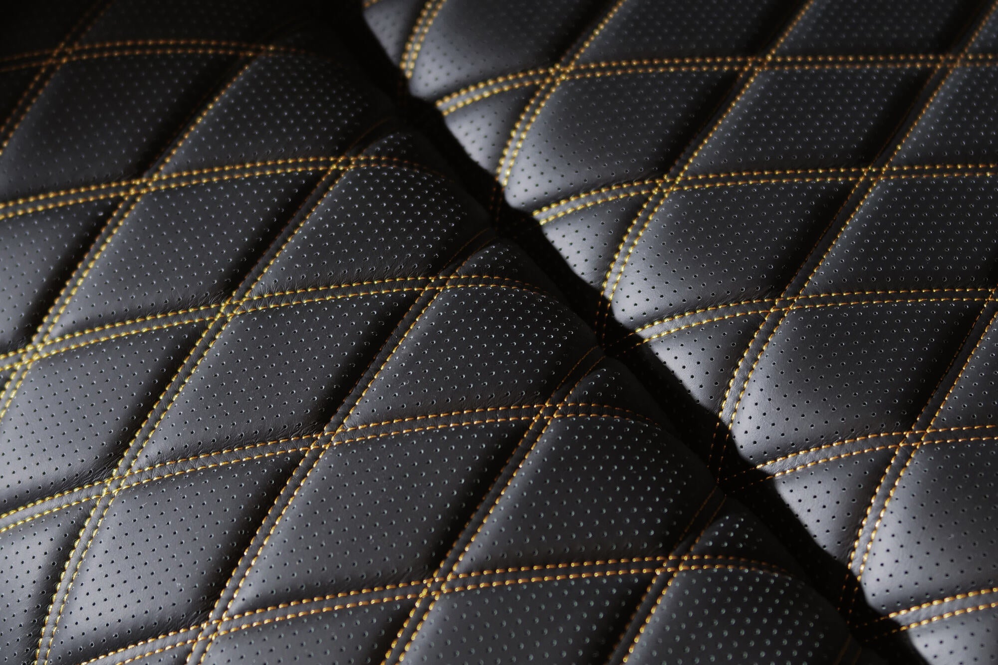 Oslo Ultimate perforated Nappa leather with gold stitching